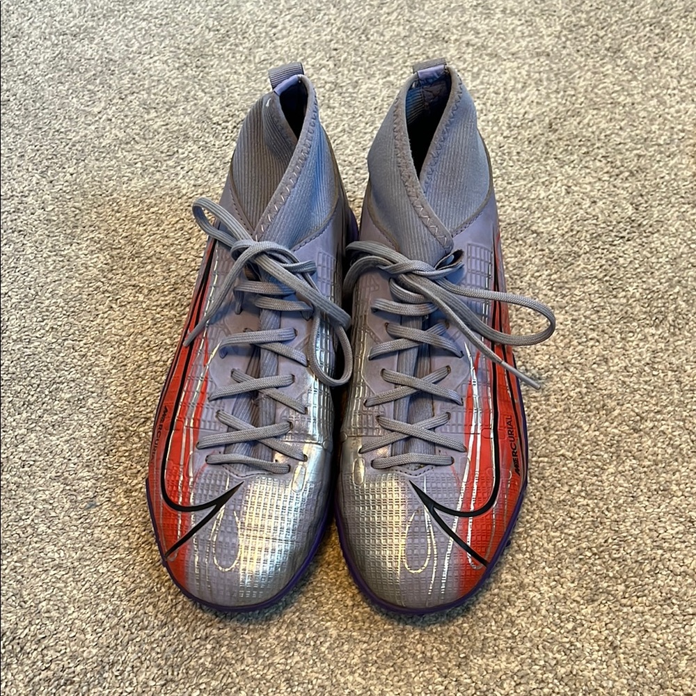 Nike indoor soccer cleats, purple, silver and orange. Youth size 4.5